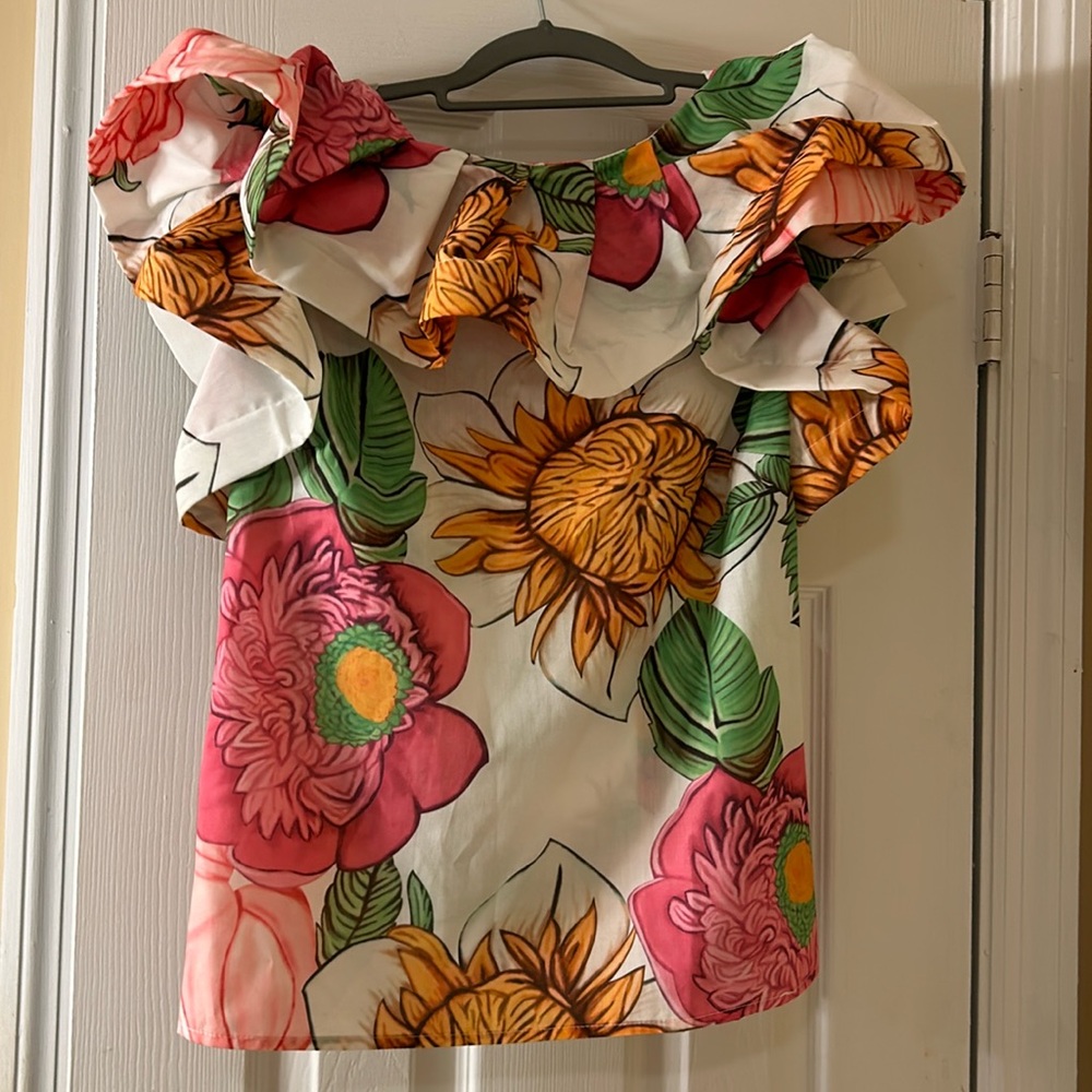 Like new Touch Me top.  Bright colors with large ruffle.